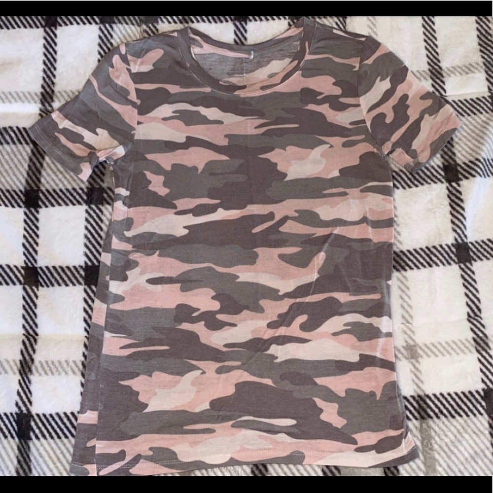Size small pink camouflage shirt.